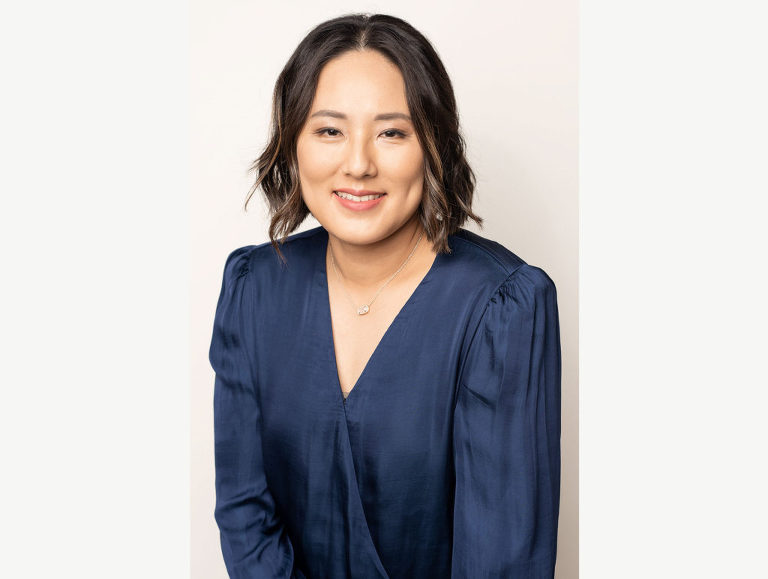 Headshot of Dr. Erie Chung, physician and owner of Lotus Heath and Wellness, a concierge medical practice in Mishawaka, IN that offers a personal touch.