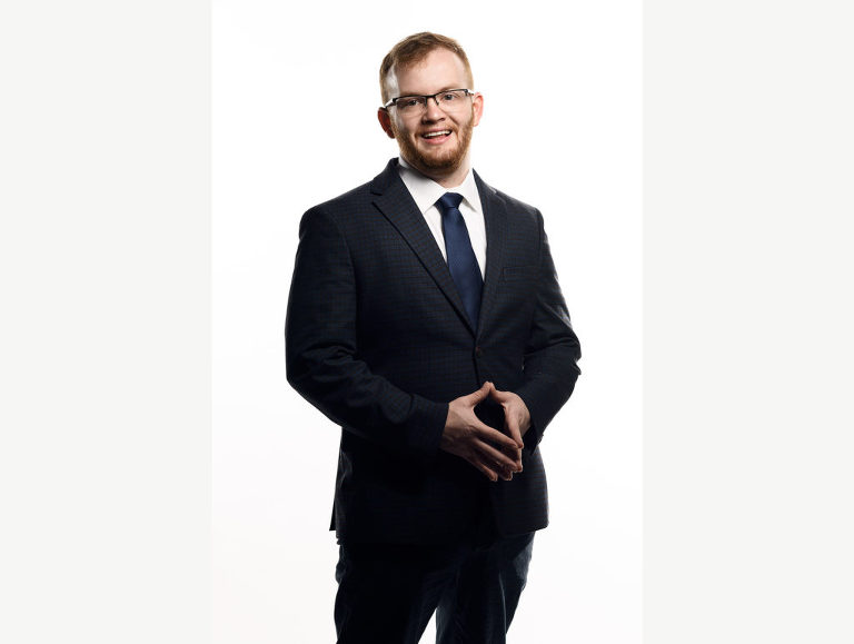 Personal branding photograph of a young professional who hopes to inspire motivation in others by relating his own story of overcoming the odds.