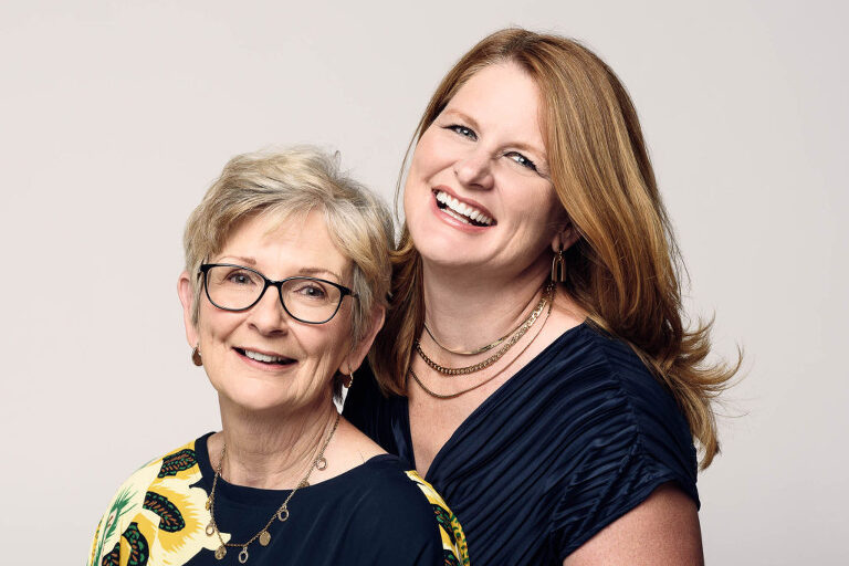Photograph of a daughter with her mother during a professional photo session.